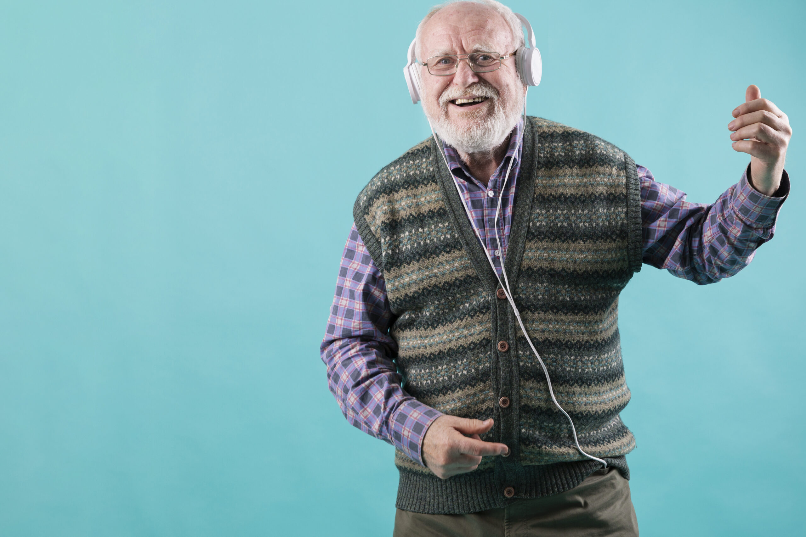 low-angle-senior-listening-music
